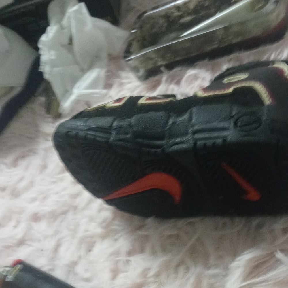 Nike Black and Red Sneakers with Durable Rubber Sole